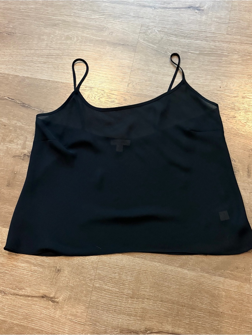 black camisole with a scoop neckline and thin adjust straps semi sheer Sz 10